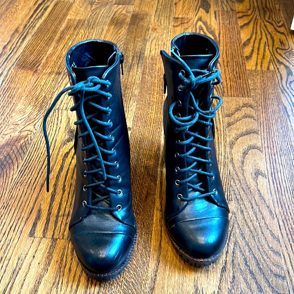 Report women’s black heeled boots